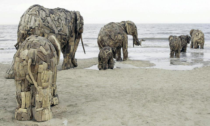 Recycle Wood Sculptures Land Art by Andries Botha http://bit.ly/V1wSKL