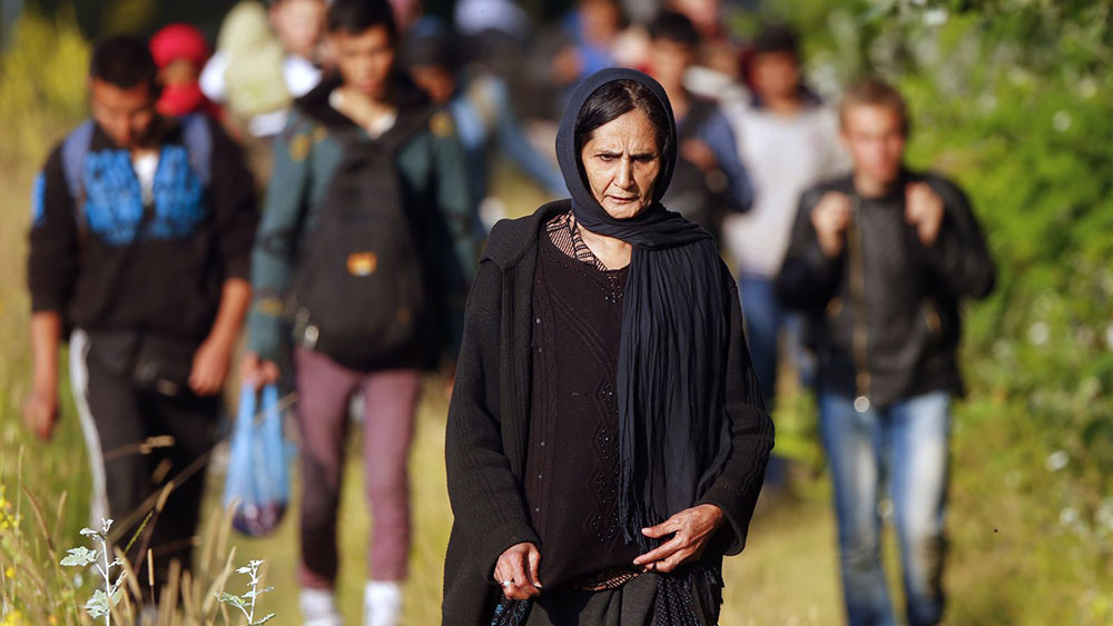 Izbeglica iz Avganistana, granica između Srbije i Mađarske, foto: Laszlo Balogh, Reuters