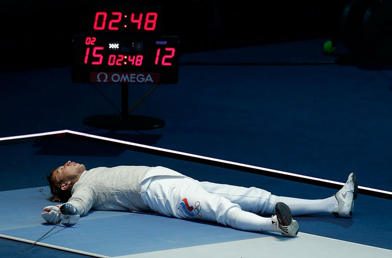Ruski sportista na Olimpijadi u Londonu © Andrew Medichini/AP