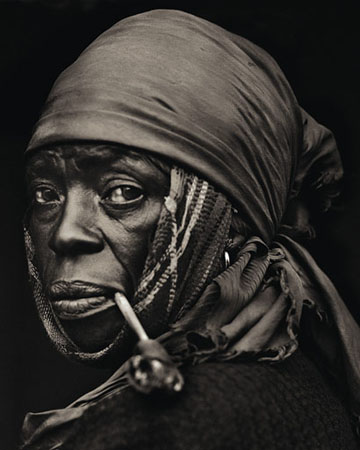 Haiti woman with pipe, Dana Gluckstein