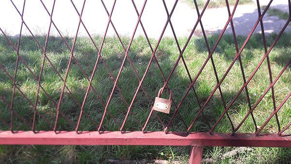 padlock on a fence